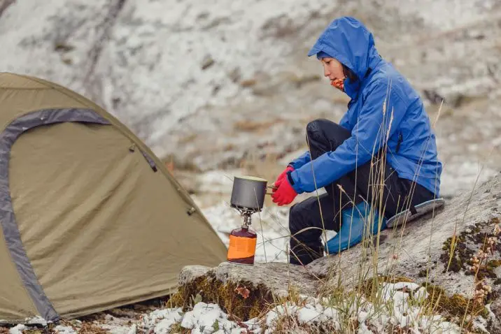 boiling water outside of tent