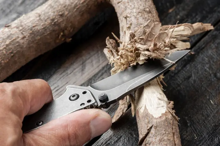 knife cutting wood